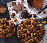 Hover - Overhead view of Hot Cocoa CaramelCrisp Mix in a kitchen scene with ingredients